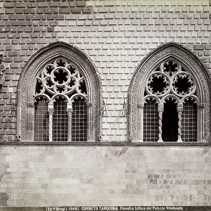 Gothic three light windows, facade of the Vitelleschi Palace in Tarquinia