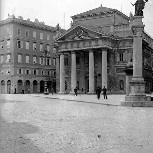 Place de la Bourse with the Palace of the Chamber of Commerce (formerly the Stock Exchange) and the column with the statue of Leopold I in Trieste