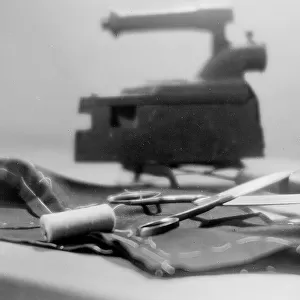 Spool and scissors; Photo studio