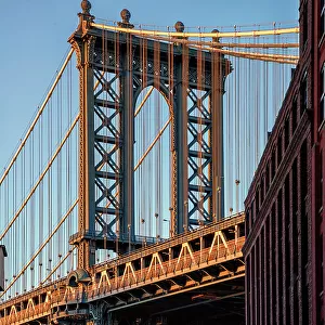 New York City, Brooklyn, Dumbo, Manhattan Bridge, Empire State Building seen through pillars of bridge