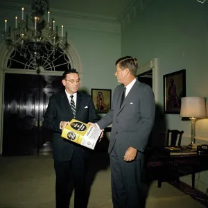 Print of Representative Edward Boland presenting Webster's Dictionary to President Kennedy Print of Representative Edward Boland presenting Webster's Dictionary to President Kennedy