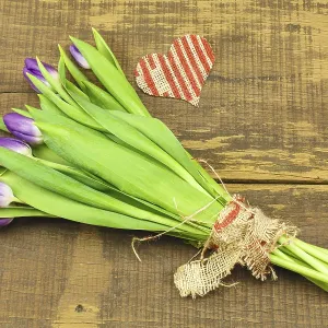 Bouquet of Tulips on Wooden Background and Heart