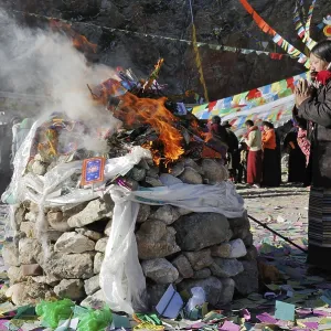 pile, piles, Heap, Heaps, note, notes, daytime, day, daylight, Buddhism, pyramid, pyramids, burning, burnings, prayer, prayers, faith, belief, religion, religions, woman, women, women's, woman's, womans, soil, soils, fire pit, fire pits, fireplace