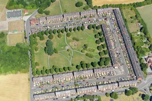 Prints of Bolsover Model Village colliery workers cottages, Derbyshire, 2022 England from the Air - Landscapes, Cities and Heritage: Bolsover Model Village Print, Derbyshire