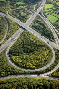 Prints of BROADSPRING WOOD, Fulmer, Buckinghamshire. Aerial view. Junction 1A on the M40 joining the M25 motorway between Uxbridge and Gerrards Cross Buckinghamshire Prints: M40 and M25 Motorway Junction Aerial Print