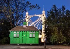 Prints of Cabmen's Shelter, Chelsea Embankment, Kensington and Chelsea, London. View of the shelter with the Albert Bridge in the background Architecture in England - Historic and Modern Buildings: Print of Cabmen's Shelter on Chelsea Embankment