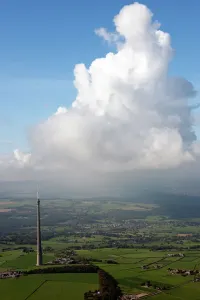 Prints of Emley Moor, Kirklees. Aerial oblique view showing the Arqiva Tower transmission mast. Completed in 1971 the tower broadcasts UHF TV signals to most of Yorkshire Industry and Agriculture in England - Factories, Farming and Production: Emley Moor Print: Aerial View of the 1971 UHF TV Transmission Mast