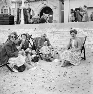 Bournemouth Beach Print: Women Seated in Deckchairs with Ice Creams
