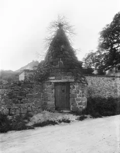 Prints of The Round House, Main Street, Breedon On The Hill, Leicestershire. An 18th century circular Lock-Up Then and Now England - Historic Change Over Time: Round House Lock-Up Print, Breedon on the Hill