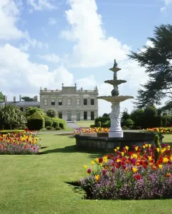 Prints of BRODSWORTH HALL AND GARDENS, South Yorkshire. View of the gardens and fountain looking towards the house.Tulips in full bloom Victoriana Prints: Brodsworth Hall and Gardens Print: A View of the Gardens