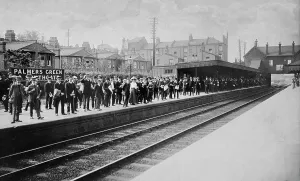 Prints of Palmers Green Station, Aldermans Hill, Greater London. General view looking south-east towards the up platform of Palmers Green station, crowded with passengers. Photographed in 1914 Greater London Prints: Print of Palmers Green Station, 1914