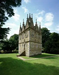 Prints of RUSHTON TRIANGULAR LODGE, Northamptonshire. View from the North East Explore England - Iconic Landmarks and Places to Visit: Rushton Triangular Lodge Print: View from the North East
