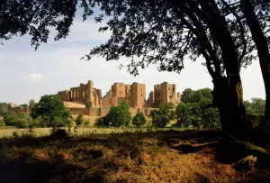 Prints of KENILWORTH CASTLE, Warwickshire. The Castle from across the mere Warwickshire Prints: Kenilworth Castle Print: A Waterfront View