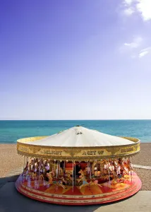 East Sussex Prints: Print of a vintage carousel on Brighton Beach
