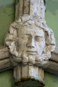 Prints of Greyfriars, Great Yarmouth, Norfolk. Stone fragment on north west wall of cloister walk. Boss in the form of a human face Sculpture Prints: Medieval Stone Sculpture Print - Face N100312