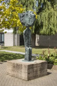 Prints of Father Courage (1960) by Frederick Edward McWilliam, (located near the Gulbenkian Cinema). University of Kent, Canterbury, Kent. General view from the south west. Photographed by Steven Baker 2015 Sculpture Prints: Print of Father Courage sculpture in bronze