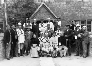 Prints of Headington Quarry Morris Dancers outside the Chequers public house, Headington, Oxfordshire Oxfordshire Prints: Print of Morris Men outside the Chequers public house