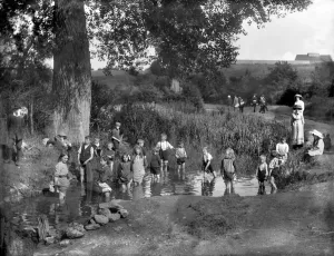 Print of children playing in a sheep-washing pool at Barracks Lane, Cowley