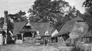 A 17th-century farm building range in a U-shape, visible from the east