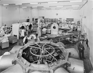 Prints of West Cumberland Hospital, Homewood Road, Homewood, Whitehaven, Copeland, Cumbria. Workers washing and pressing bed linen in the laundry at West Cumberland Hospital Cumberland Prints: Print of Hospital Laundry, West Cumberland Hospital, 1964