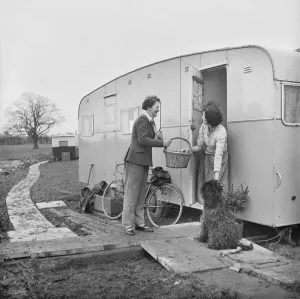 Prints of BERKELEY POWER STATION, BERKELEY, HAM AND STONE, STROUD, GLOUCESTERSHIRE House And Home Prints: Print of a woman delivering groceries in Berkeley, Gloucestershire