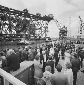 Prints of Graythorp, Hartlepool. A crowd of people gathered at Graythorp for the naming ceremony of the oil platform Graythorp II Industry and Agriculture in England - Factories, Farming and Production: Graythorp II Oil Platform Naming Day Print