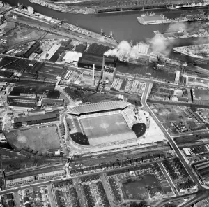 Prints of OLD TRAFFORD, Manchester. Aerial view of the home of Manchester United Football Club since 1910. Photographed in 1978. Aerofilms Collection (see Links) Manchester Prints: Old Trafford Stadium Aerial Print