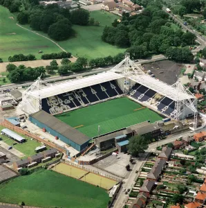 Prints of DEEPDALE Stadium Preston. Aerial view of the home of Preston North End Football Club. Photographed in 1998 when the Lilywhites were managed by David Moyes. Aerofilms Collection (see Links) Lancashire Prints: Deepdale Stadium Aerial Print