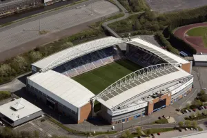 Prints of The DW Stadium, home of Wigan Athletic Football Club and Wigan Warriors Rugby League Football Club, Wigan, Greater Manchester, 2021 Greater Manchester Prints: DW Stadium Print, Aerial View of Football Ground