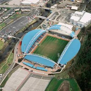 Prints of GALPHARM STADIUM, Huddersfield. Aerial view of the home of Huddersfield Town Football Club since 1995. Photographed in 1998 when it was known as the Alfred McAlpine stadium Alfred Prints: Galpharm Stadium Aerial View Print