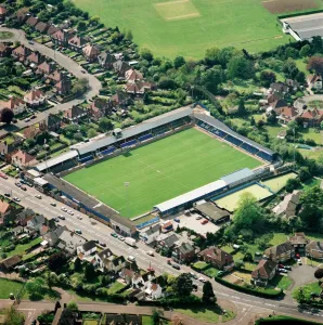 Prints of LAYER ROAD, Colchester. Home of Colchester United Football Club. Photographed in May 1998. Aerofilms Collection (see Links) Monuments And Landmark Prints: Layer Road Print, Colchester United Football Ground in 1998