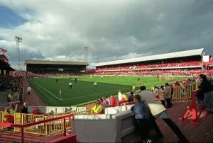 Prints of Roker Park Football Ground, Sunderland. The Main Stand and Fulwell End at Roker Park football ground, seen from the east, Roker End stand during a football game Sport Prints: Roker Park Football Ground Print (East View)