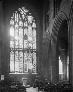 Prints of St John the Baptists Church, Fleet Street, Bablake, Coventry. A view looking along the nave towards the font in St John the Baptists Church showing damage to the west window Coventry Prints: Print of St John's Bablake, 1941: A damaged nave