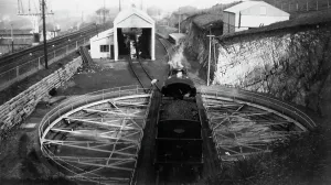 Prints of A view of the turntable at Ilfracombe Engine Shed, Devon in the 1950s. The turntable was used to turn steam locomotives so that they could return in the direction from which they had come Stations And Halt Prints: Print of Turntable at Ilfracombe Engine Shed, 1950s