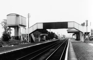 Prints of A view of Toddington station in Gloucestershire in July 1958, showing the water tower and footbridge. Toddington opened in December 1904 and closed to passengers in March 1960 Stations And Halt Prints: Toddington Station Print, July 1958
