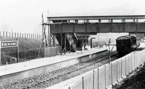 Prints of A view of Winchcombe Station in Gloucestershire, c.1910, showing the footbridge and platforms. Winchcombe station opened in February 1905 and closed to passengers in March 1960 Stations And Halt Prints: Winchcombe Station Print, c. 1910, Black and White Photograph