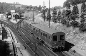 Prints of A view of Yeovil Pen Mill station in Somerset, with an autotrain travelling to Yeovil Town station Stations And Halt Prints: Yeovil Pen Mill Station Print, July 1959