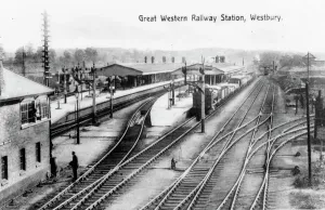 Prints of A photograph of Westbury Station in Wiltshire, c.1910, showing the signal box and tracks. The station opened in 1848 Stations And Halt Prints: Westbury Station Print, c. 1910