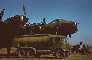 AEC tanker refuelling a Short Stirling AEC tanker refuelling a Short Stirling