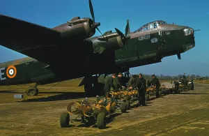 Prints of Bombs are brought on trolleys to a Short Stirling I of 1651 Heavy Conversion Unit, RAF Waterbeach 29 April 1942 World War I Prints: Short Stirling Bombs Re-arming Print