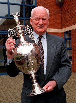 Tom Finney holds League Cup Tom Finney holds League Cup