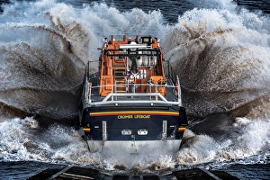 Cromer Tamar class lifeboat Lester 16-07 launching down the slipway, lots of white spray Cromer Tamar class lifeboat Lester 16-07 launching down the slipway, lots of white spray