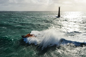 St Marys Severn class lifeboat 17-11 in rough seas off the lighthouse at Bishops Rock St Marys Severn class lifeboat 17-11 in rough seas off the lighthouse at Bishops Rock