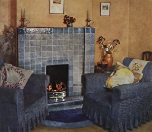 1930s living room with fireplace and chairs 1930s living room with fireplace and chairs