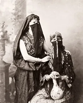 19th century vintage photograph - Egypt - portrait of veiled Egyptian women with a vase 19th century vintage photograph - Egypt - portrait of veiled Egyptian women with a vase