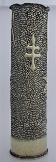 76 mm shellcase with an Art Deco design of floral embossing 76 mm shellcase with an Art Deco design of floral embossing
