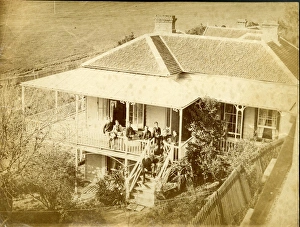 Aerial photograph of house with group of people Aerial photograph of house with group of people