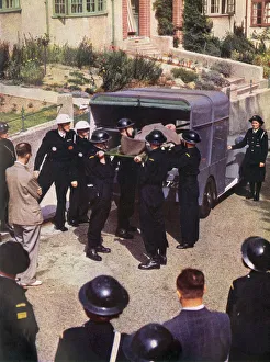 An Ambulance with Wardens helping in an emergency An Ambulance with Wardens helping in an emergency
