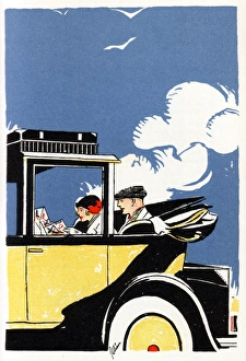 American couple studying a map in an elegant automobile American couple studying a map in an elegant automobile