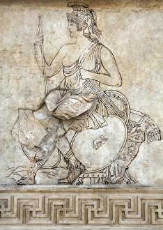 Ara Pacis Augustae. Goddess Roma, sitting on a pile of troph Ara Pacis Augustae. Goddess Roma, sitting on a pile of troph